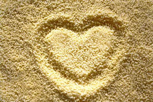 Couscous grains with a heart by Kseniya Nekrasova