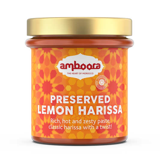 Amboora preserved lemon harissa in a jar with natural ingredients like fresh chillis, lemons and herbs