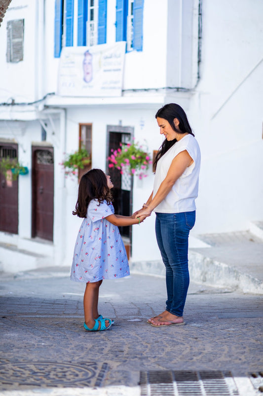 Nadia founder of Amboora standing face to face with her daughter in Morocco
