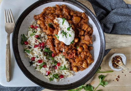 Beef Tagine with Pomegranate Seeds and Flaked Almonds