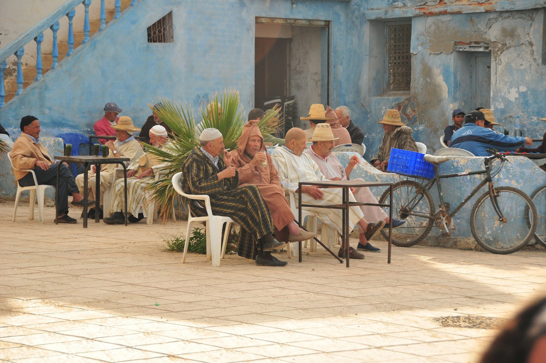 Moroccan men sitting drinking coffee
