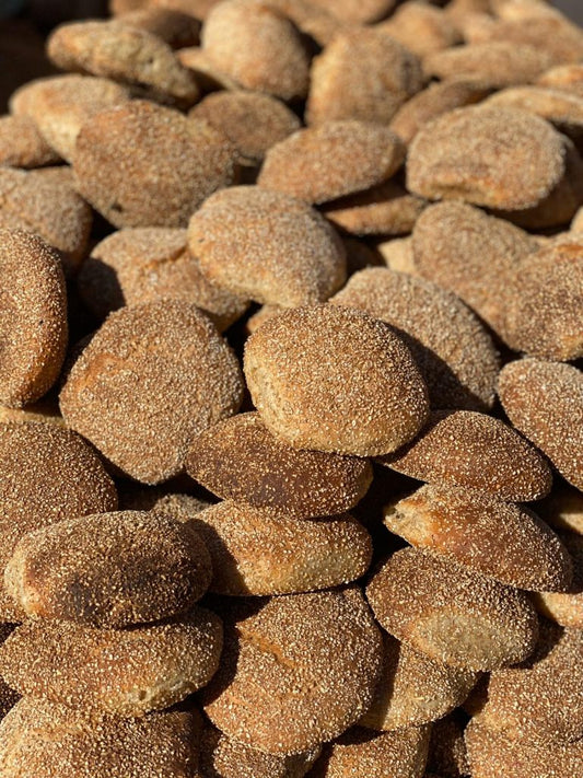 Multiple Moroccan bread khobz piled high