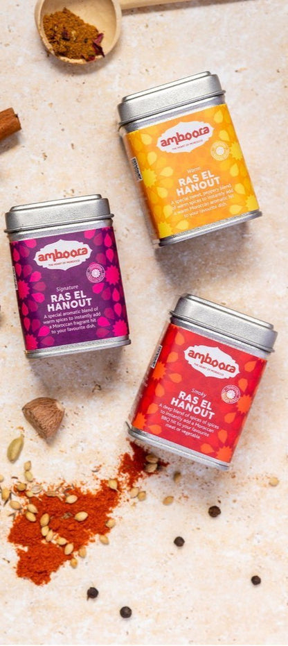 Amboora spice blends laid flat with spices