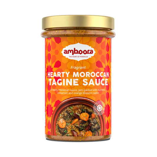 Amboora Hearty Moroccan Tagine Sauce in a jar with natural ingredients like ginger, dates and turmeric