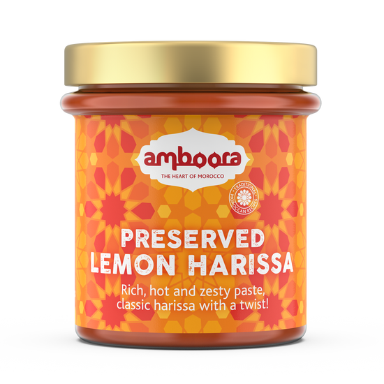 Amboora preserved lemon harissa in a jar with natural ingredients like fresh chillis, lemons and herbs